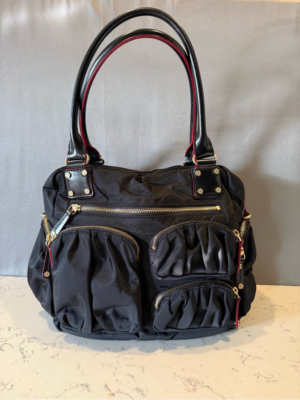 MZ Wallace Black Shoulder Tote with Gold Hardware and Red Trim